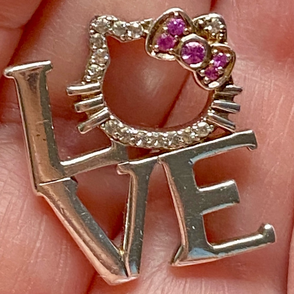 Hello Kitty Simmons Jewelry Pendant, 925 Silver with pink and white Sapphires.